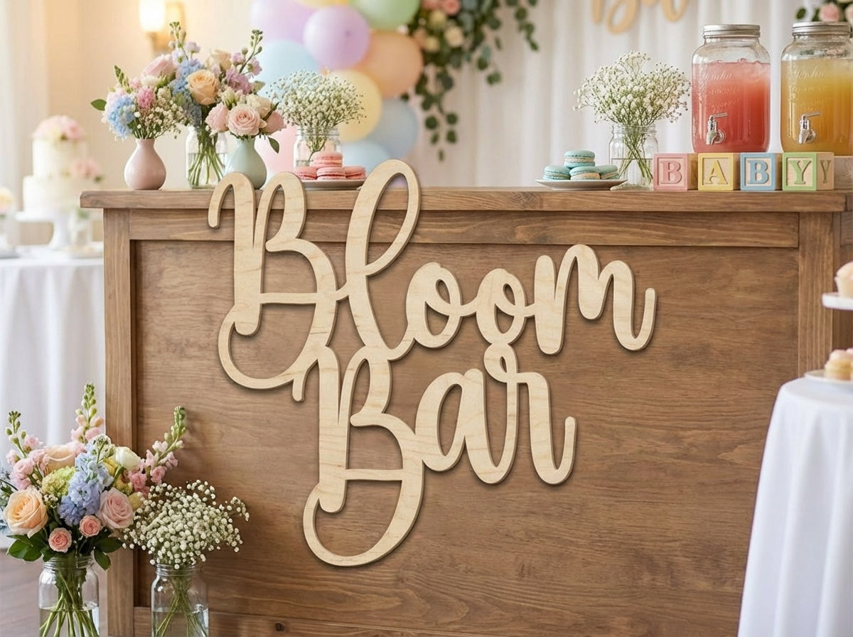 Custom wood name sign in script lettering displayed on a decorated wall