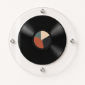 Clear round acrylic frame displaying one 12-inch vinyl record