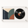 Studio view of clear acrylic frame for a vinyl record and album cover