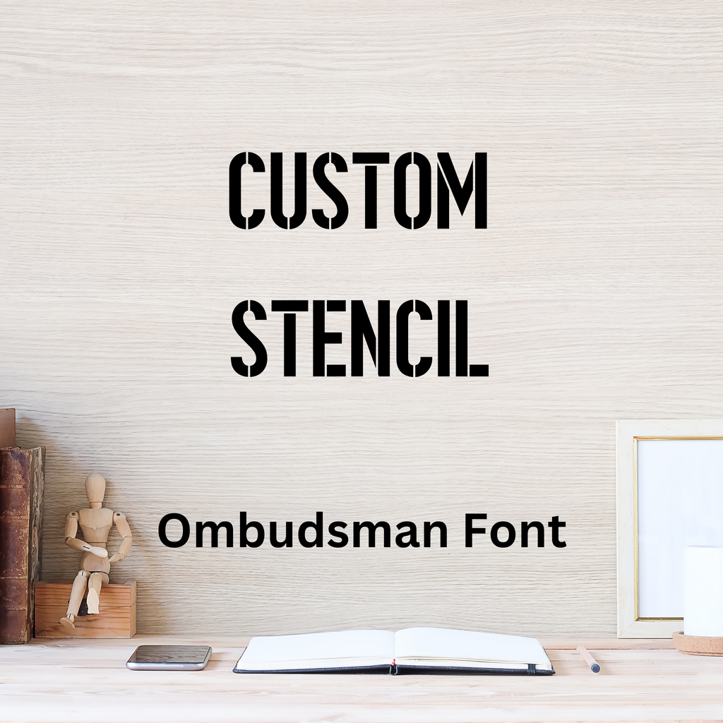 Custom stencil lettering sample in the Ombudsman font, a bold condensed military stencil typeface