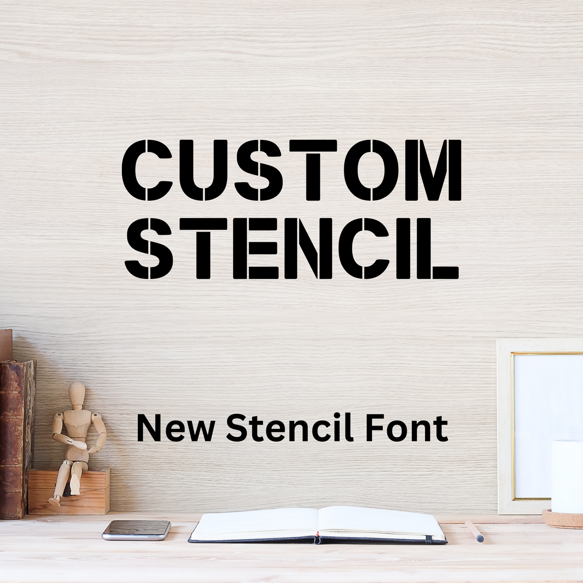 Custom stencil lettering sample in the New Stencil font, a heavy block stencil typeface