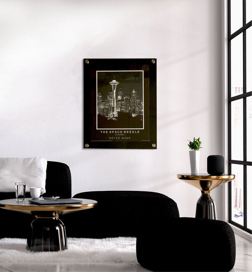 Black backed floating acrylic picture frame with a Space Needle print in a modern living room